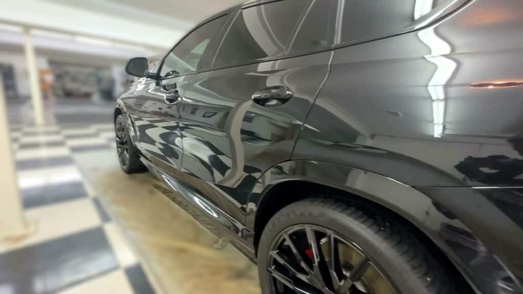car detailing in ct showing glossy black bmw
